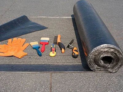 Commercial flat roof repair in progress