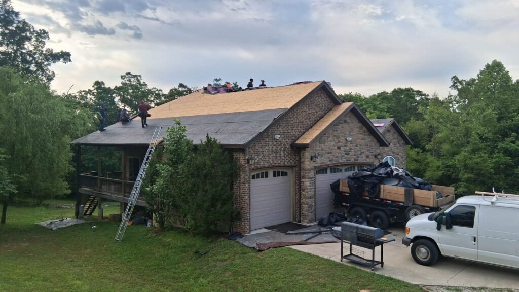 Bold Roofing crew installing underlayment during a roof replacement in Branson, MO