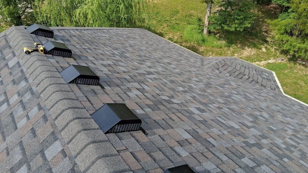 New Williamsburg Gray architectural shingles and roof vents on a Branson, MO home